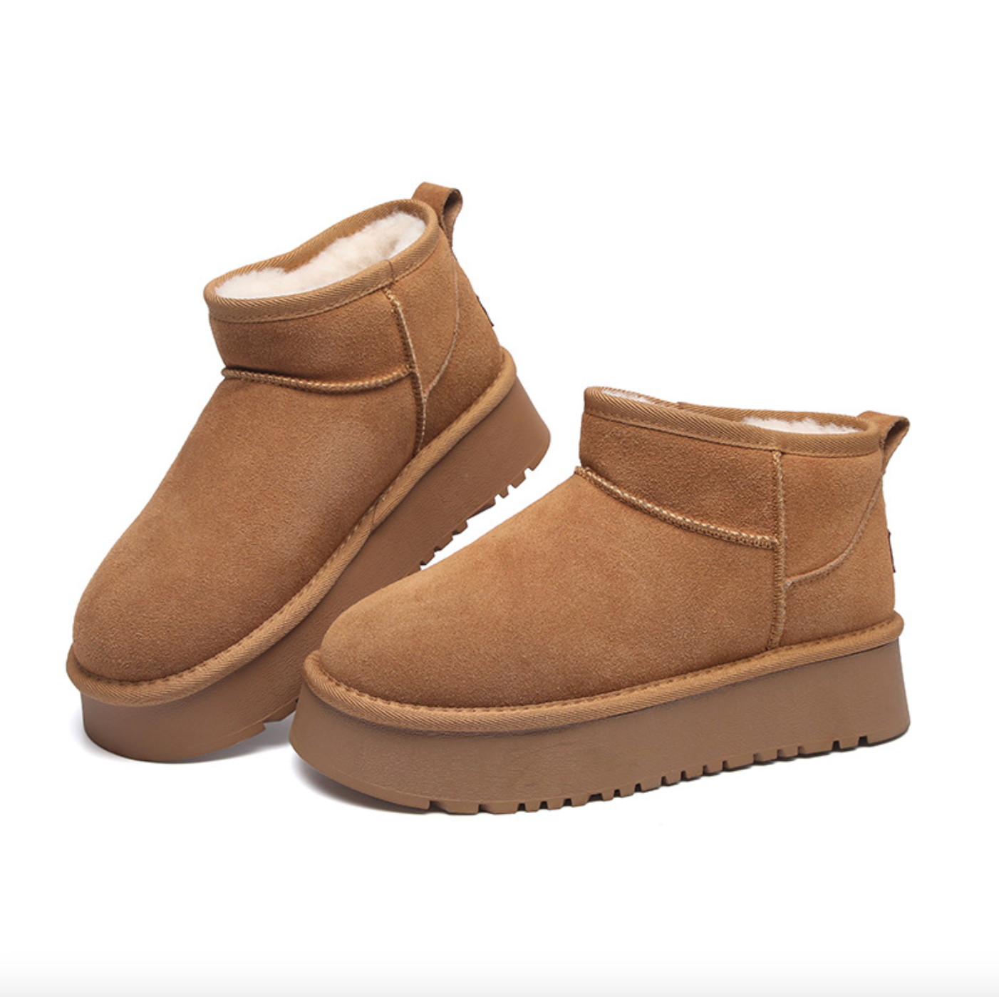 Brown suede ankle boots with a plush interior and thick rubber sole.